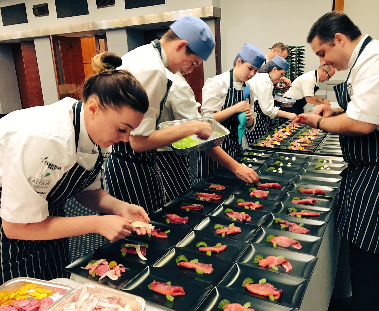 The young chefs were helped in the kitchens by a selection of Compass chefs