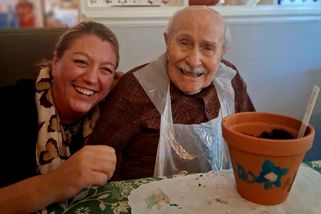 laura-tighe-md-white-oaks-takes-part-in-volunteering-with-a-resident.jpg