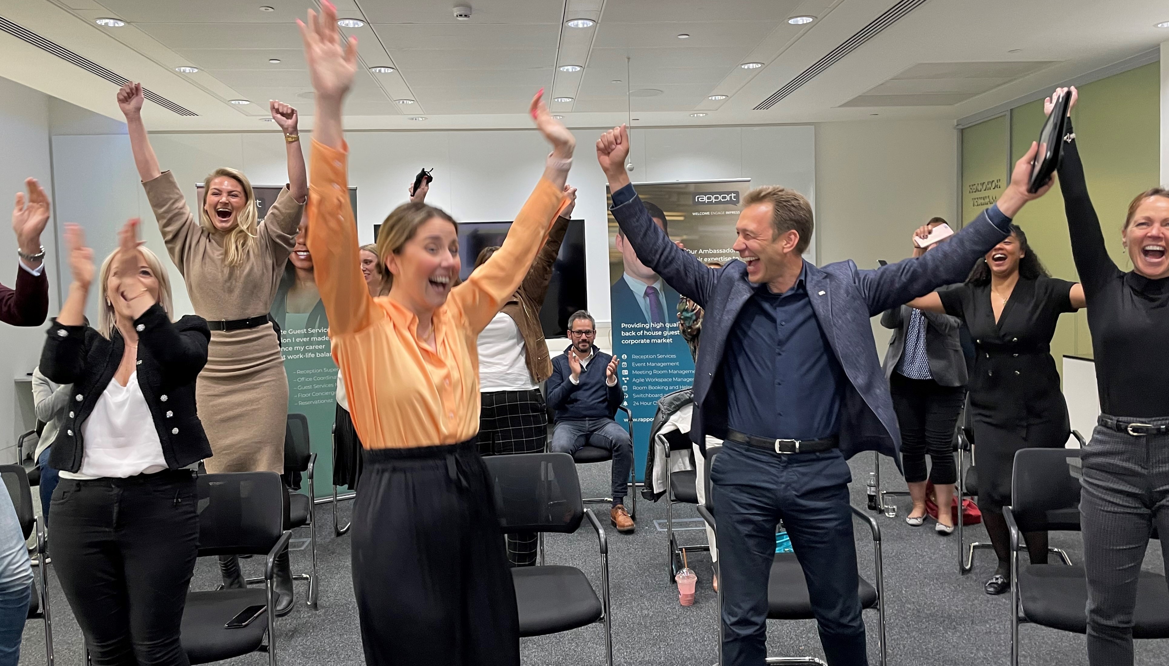 Greg Mace and Rapport Team Celebrating Best Companies Success