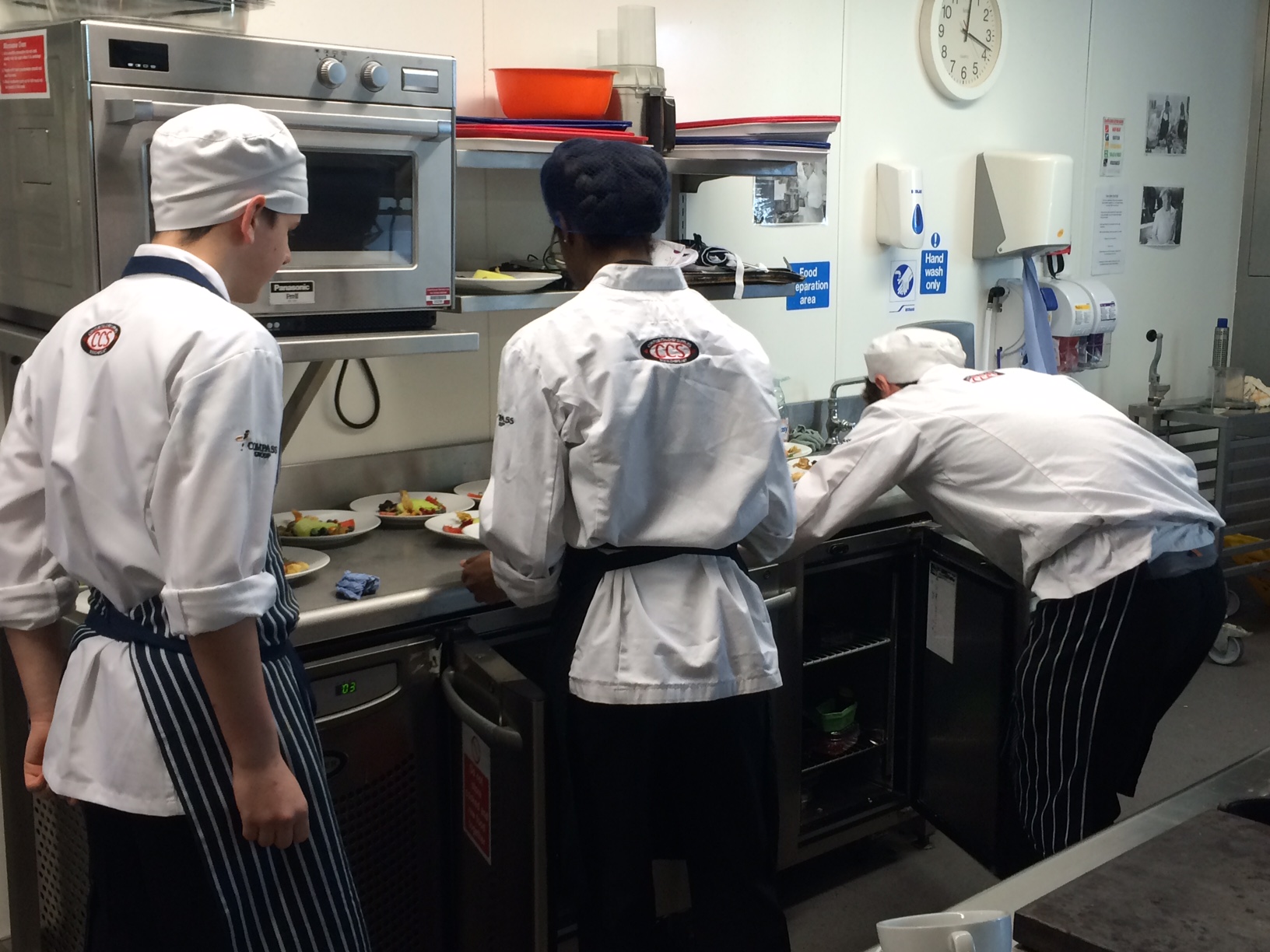 Young chefs working hard