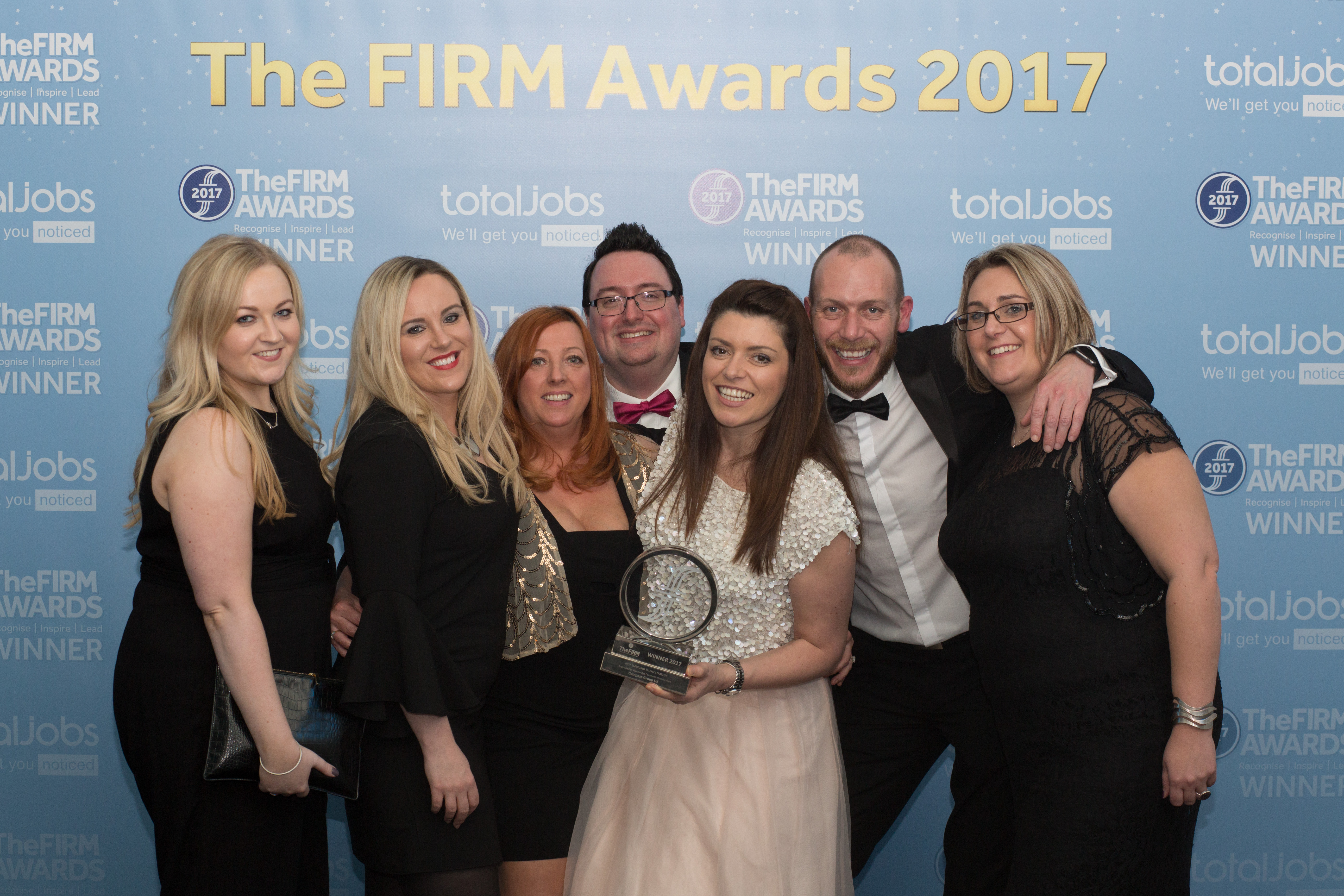 The apprenticeship team celebrating taking the Best Emerging Talent Strategy